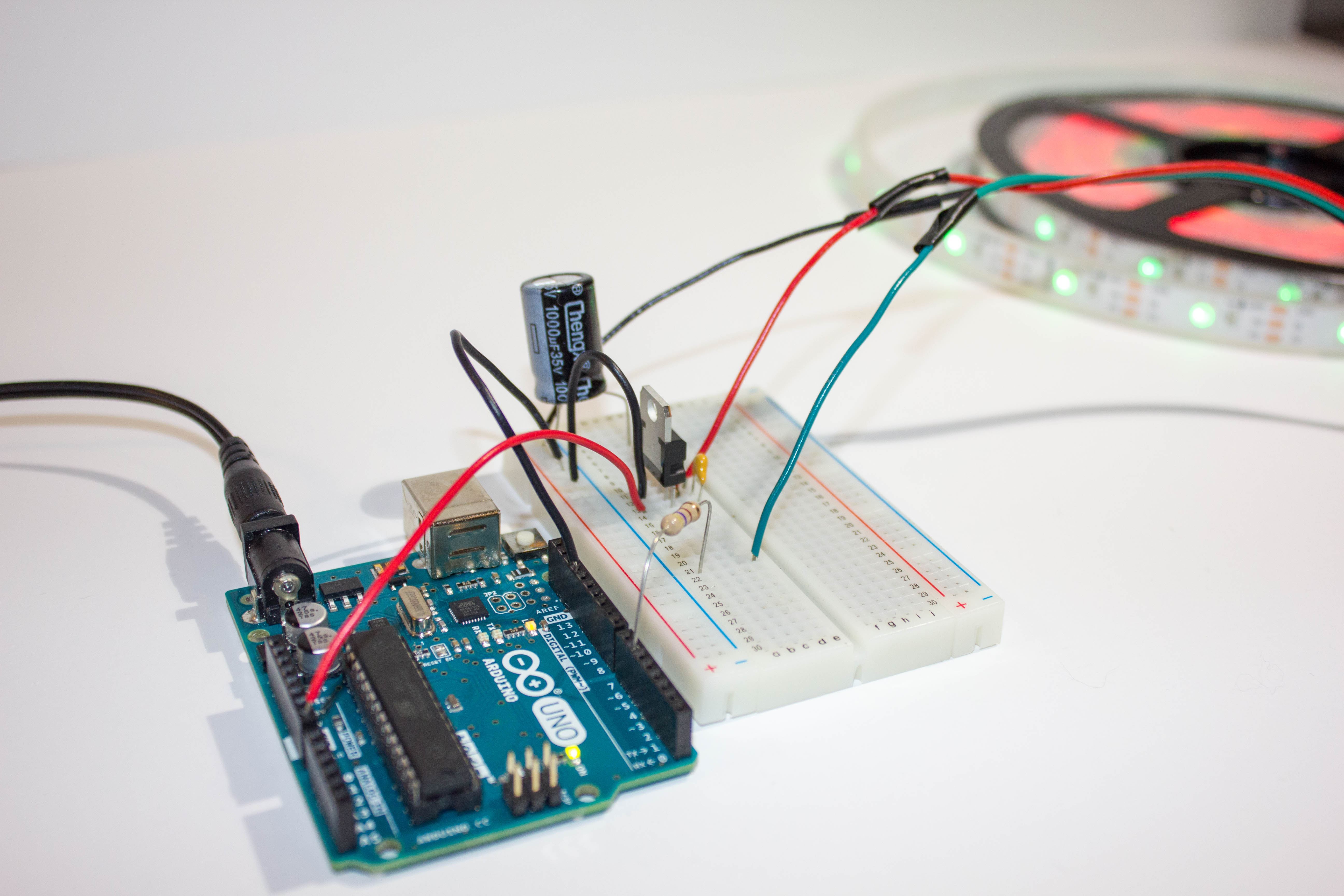 An LED strip powered via a voltage regulator.